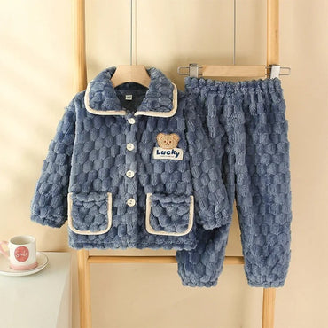 Ensemble de pyjama chanceux des enfants duvets