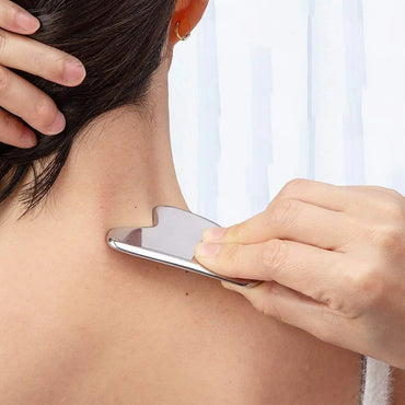 Masseur gua-sha en acier inoxydable